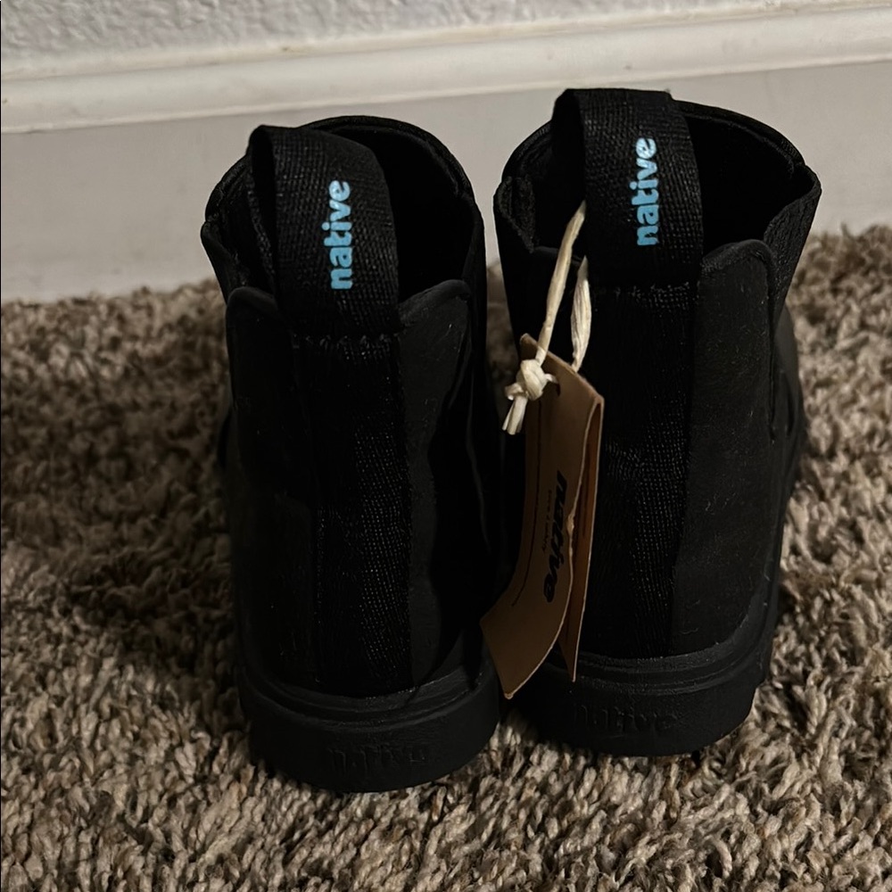 Native Black Boots with Side Zipper and Monochrome Design
